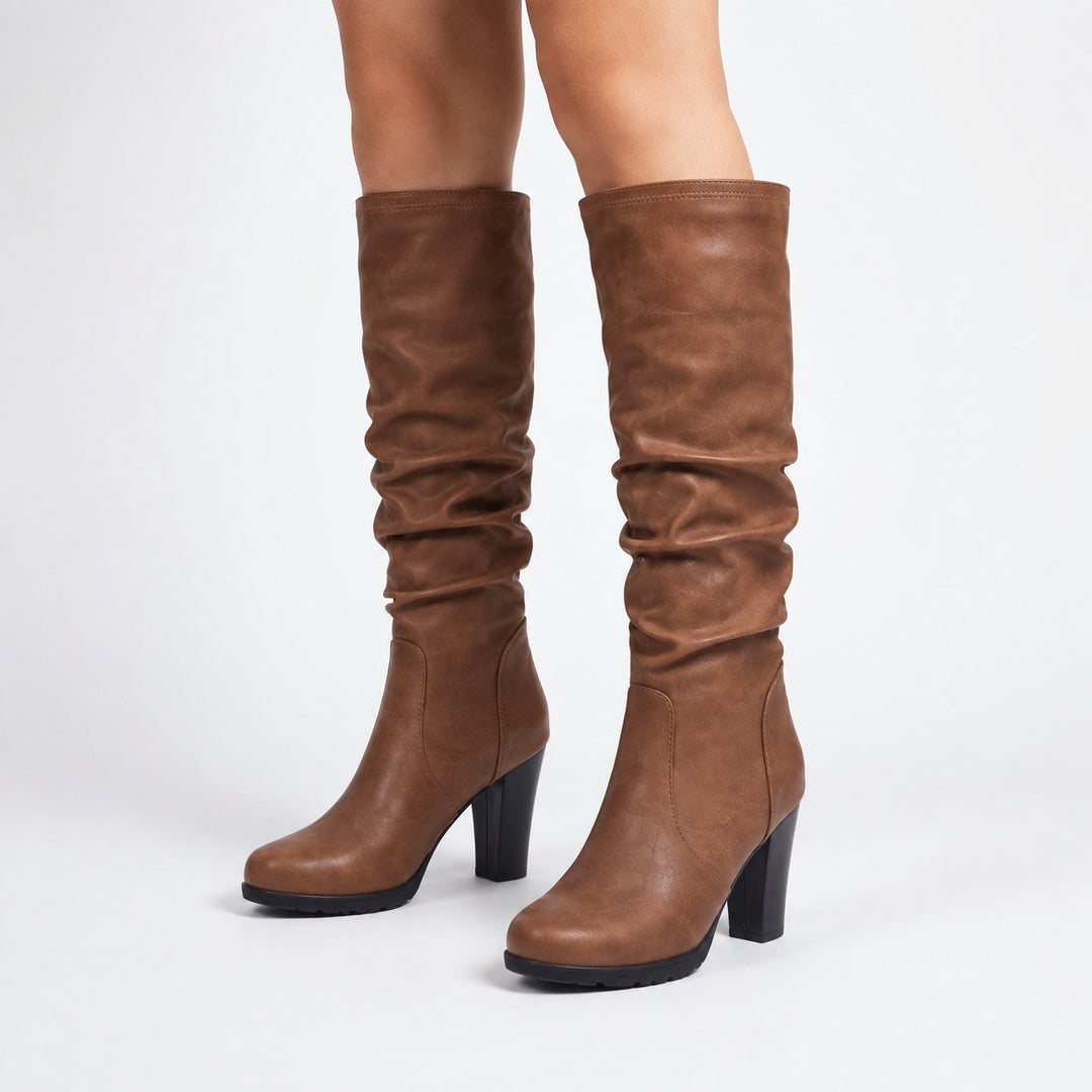 Avarielle | Women's Brown Slouchy Round Toe Block Heel Faux Leather Knee High Boot — 1